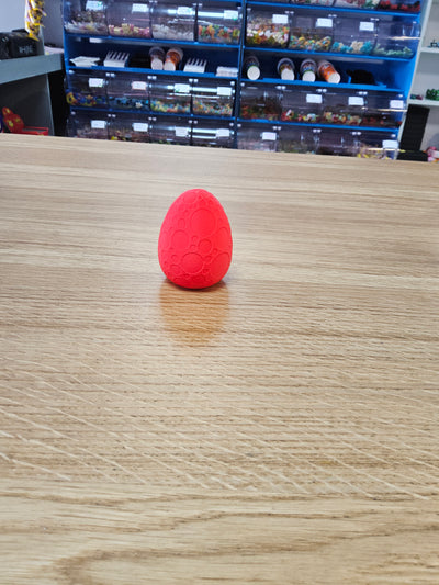 3D Printed Dinosaur egg with a small T-rex inside